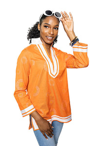 OrangeOrange; tunic with white trim & collar.  Gold circles