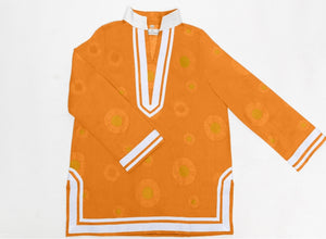 Orange; tunic with white trim & collar.  Gold circles